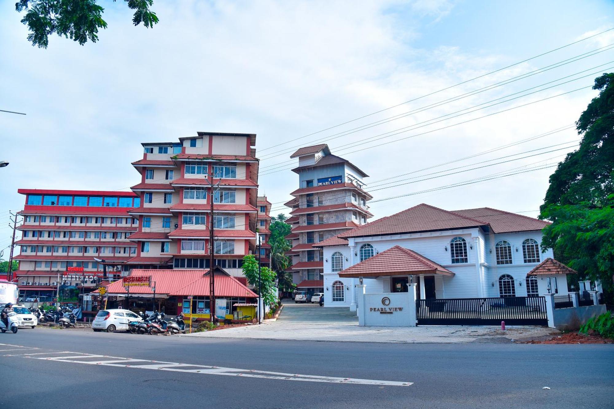 The Pearl View Hotel Mulappilangād Esterno foto